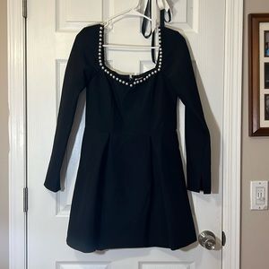 long sleeve black dress with pearl accents